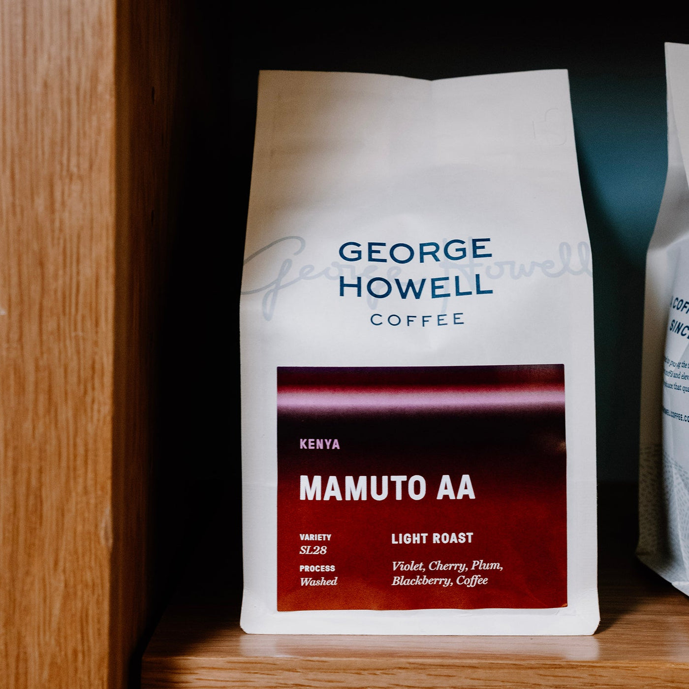 George Howell Coffee bag of Kenya Mamuto AA on a wooden shelf